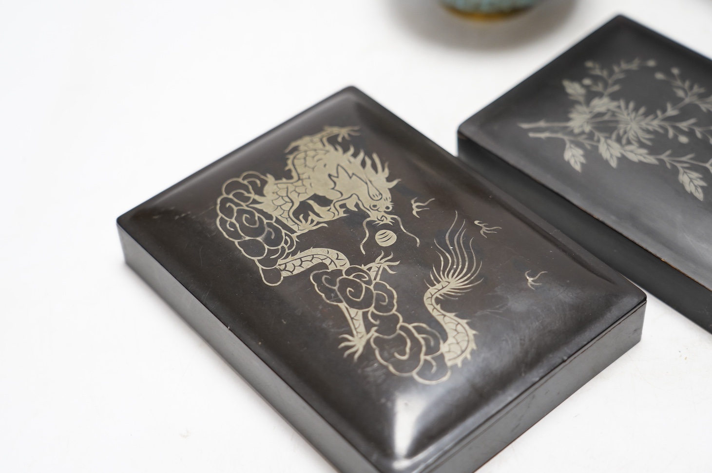 A Chinese cloisonné enamel vase, 13cm, and a set of five graduated lacquer boxes, the lids with inlaid silver decorations, largest 13.5 x 10 x 6.5cm. Condition - good